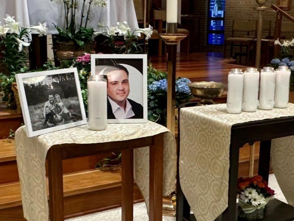 A memorial for Joshua Barrick is on display at Holy Trinity Catholic Church in Louisville (AP)