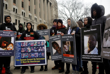 Protesters stand outside the Leighton Criminal Courts Building during the sentencing of former Chicago police officer Jason Van Dyke in Chicago, Illinois, U.S., January 18, 2019. REUTERS/Joshua Lott