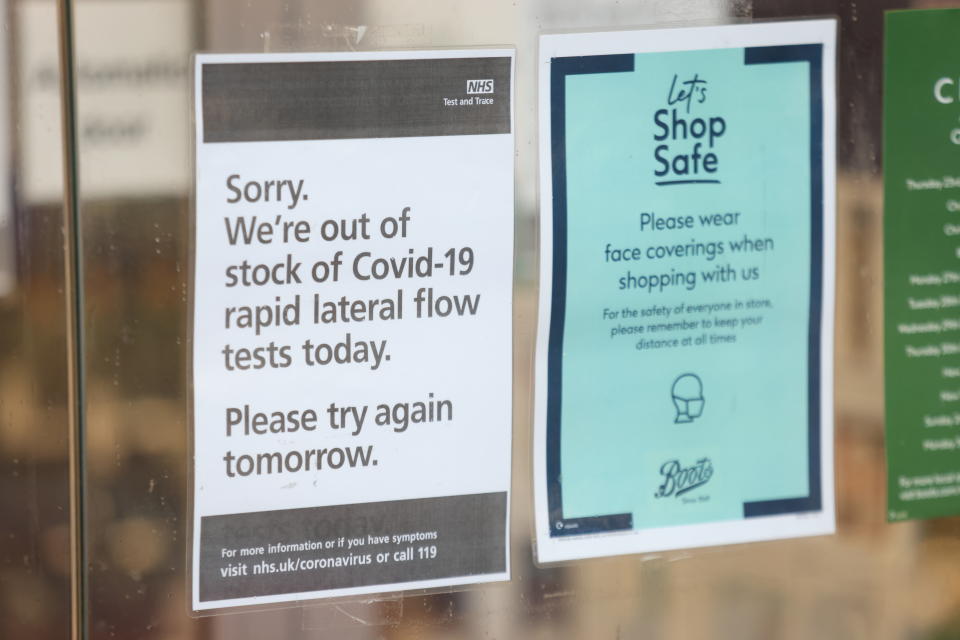 An out of stock lateral flow test sign on the window of a Boots pharmacy in London. Picture date: Wednesday December 29, 2021.