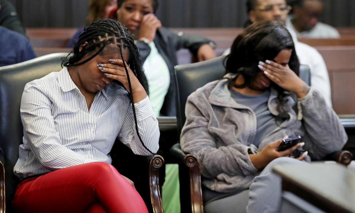 Victims Teasijah Rogers, left, and Kayla Holt, right, react as Cheyann Balas, not pictured, recalls the day all three were violently confronted by Jason Turkovich at his sentencing Thursday in Judge Kathryn Michael’s courtroom at the Summit County Courthouse.