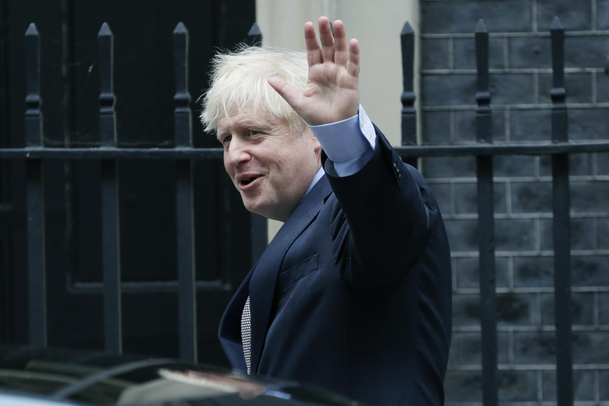 Britain's Prime Minister Boris Johnson leaves Downing Street to attend the weekly session of Prime Ministers Questions in Parliament in London, Wednesday, Sept. 9, 2020. (AP Photo/Kirsty Wigglesworth)