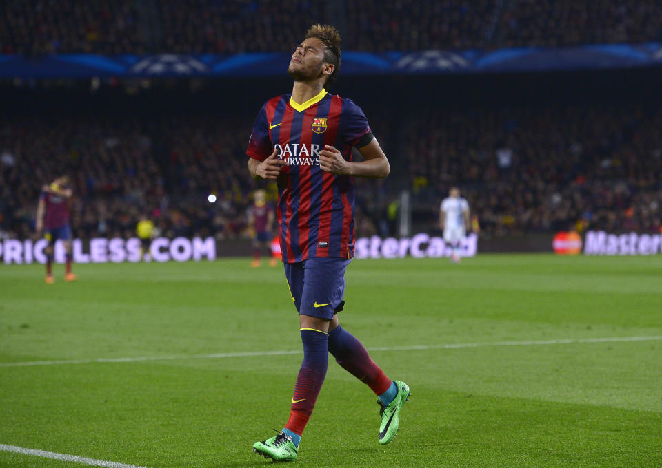 Barcelona's Neymar reacts after a failed attempt to score during a Champions League, round of 16, second leg, soccer match between FC Barcelona and Manchester City at the Camp Nou Stadium in Barcelona, Spain, Wednesday March 12, 2014. (AP Photo/Manu Fernandez)