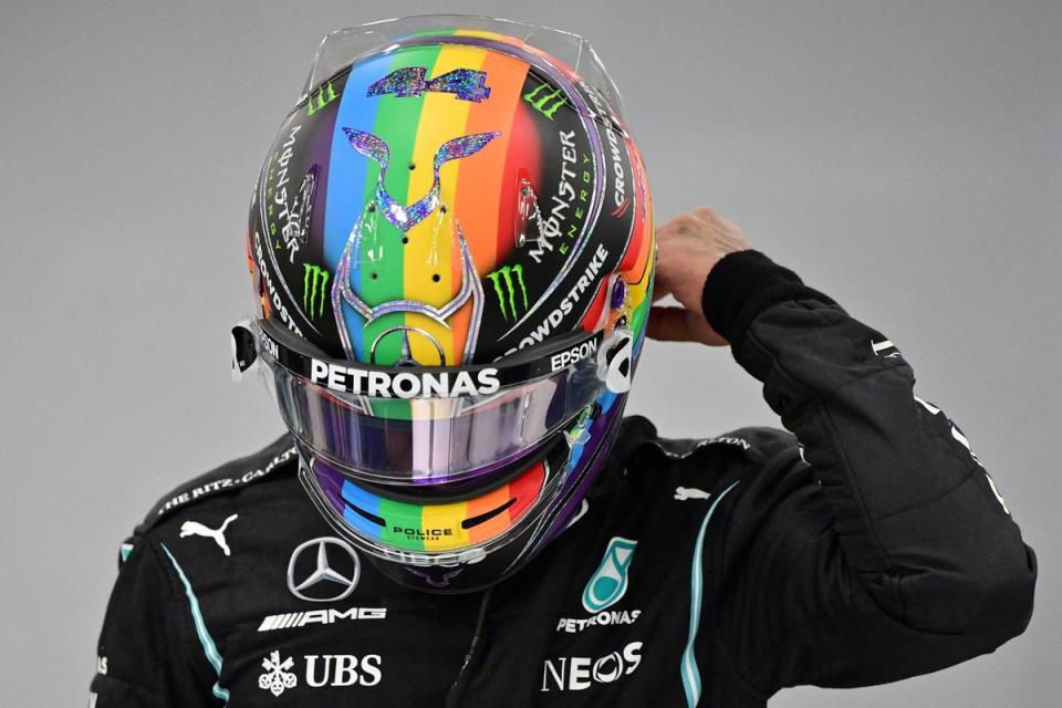 Lewis Hamilton makes a gesture in support of the LBGTQ community (AFP/Getty)