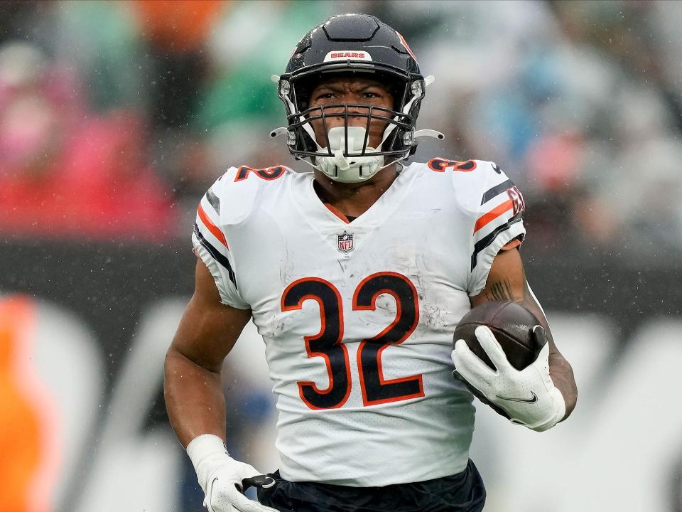 David Montgomery carries the ball against the New York Jets.