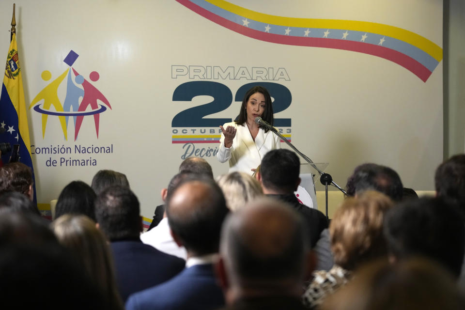 Maria Corina Machado gives a press conference after a ceremony with the Opposition Primary Commission to recognize her electoral win in the opposition-organized primary election to choose a presidential candidate in Caracas, Venezuela, Thursday, Oct. 26, 2023. (AP Photo/Ariana Cubillos)