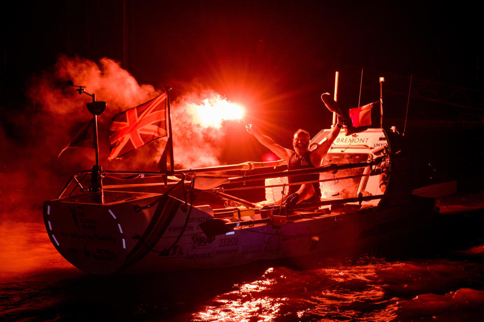 Lee Spencer, a 49-year-old single-leg amputee, celebrates as he becomes the world&rsquo;s first physically disabled person to row solo across the Atlantic, completing the feat in 60 days, on March 11, 2019, in Cayenne, French Guiana.&nbsp; (Photo: Anthony Upton/Rowing Marine via Getty Images)