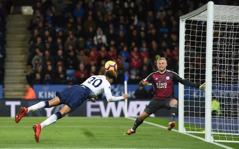 Alli heads his 50th goal for Tottenham to seal the win over Leicester - Credit: AFP