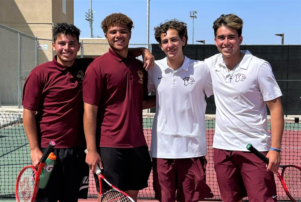 Granite Hills' Chris Grantham and Jace Esplin, pictured in white shirts, beat Barstow’s Gabriel Melton and Darrien Tyler for the doubles title at the Desert Sky League Finals on Thursday, April 29, 2022.