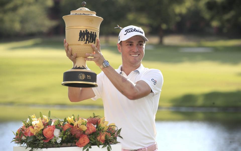 Justin Thomas of the US hoists the Gary Player Cup after the final round of the World Golf Championships-FedEx St. Jude Invitational golf tournament at TPC Southwind in Memphis, Tennessee, USA, 02 August 2020. - TANNEN MAURY/EPA-EFE/Shutterstock