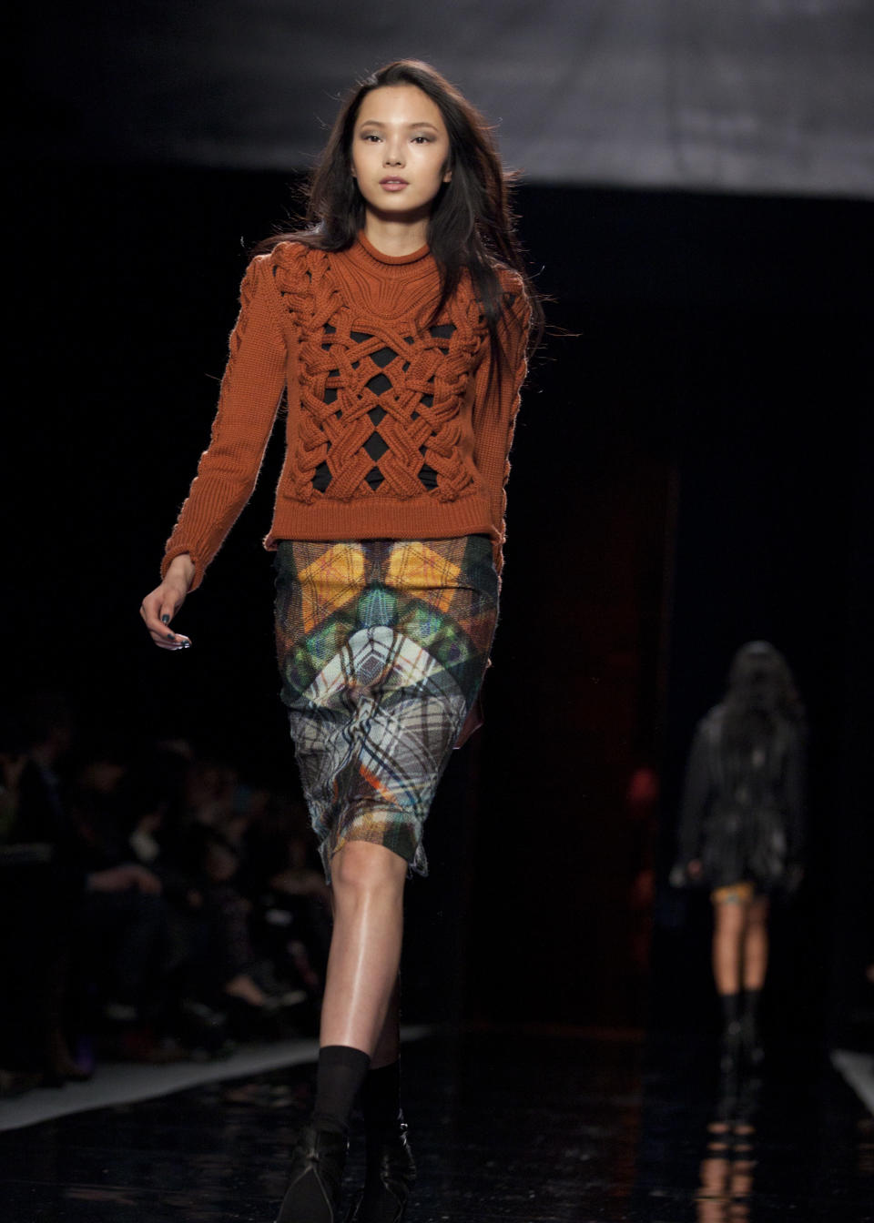 A model walks the runway during the Nicole Miller Fall 2013 fashion show during Fashion Week, Friday, Feb. 8, 2013, in New York. (AP Photo/Karly Domb Sadof)