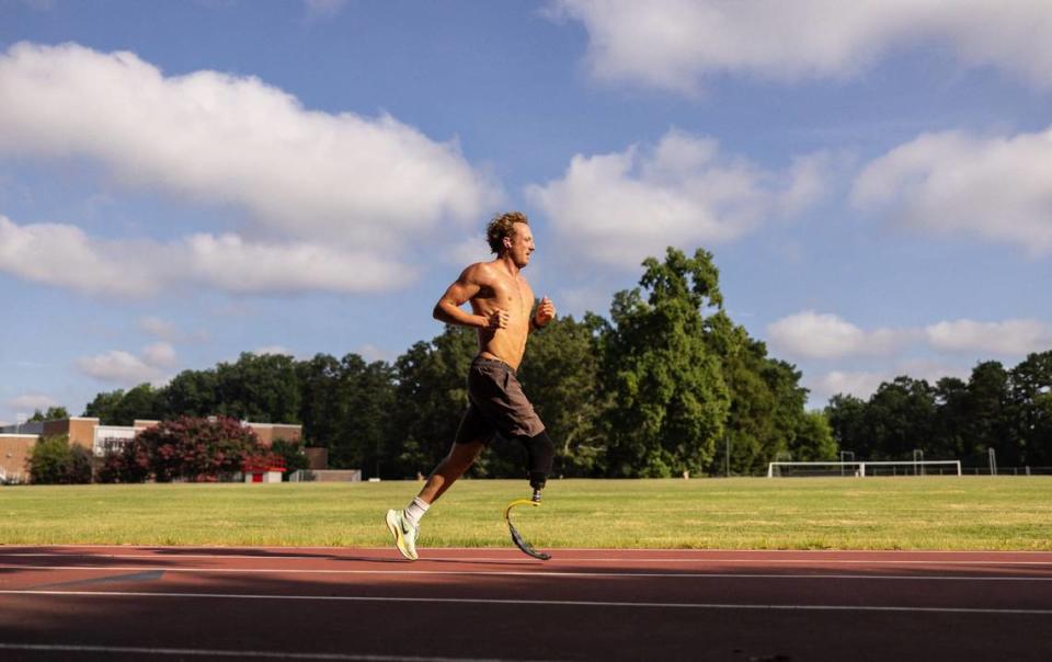 Carson Clough trains for the Paralympics triathlon at Alexander Graham Middle School in Charlotte, N.C., on Saturday, July 6, 2024.