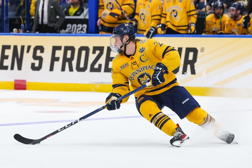 Zach Metsa skates with the puck for Quinnipiac in the Frozen Four in Tampa.