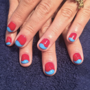 <p>Make your holiday look more fit for summer as a whole with lighter shades of red and blue. The little curve detail on top is an elevated version of a French mani.</p><p><a class="link " href="https://www.amazon.com/Hand-Nail-Harmony-Gelish-Ounce/dp/B075LZWL8D/ref=sr_1_1?keywords=gelish-%2Bhot%2Brod%2Bred&qid=1560188469&s=gateway&sr=8-1&th=1&tag=syn-yahoo-20&ascsubtag=%5Bartid%7C10072.g.27727694%5Bsrc%7Cyahoo-us" rel="nofollow noopener" target="_blank" data-ylk="slk:SHOP POLISH;elm:context_link;itc:0;sec:content-canvas">SHOP POLISH</a></p>