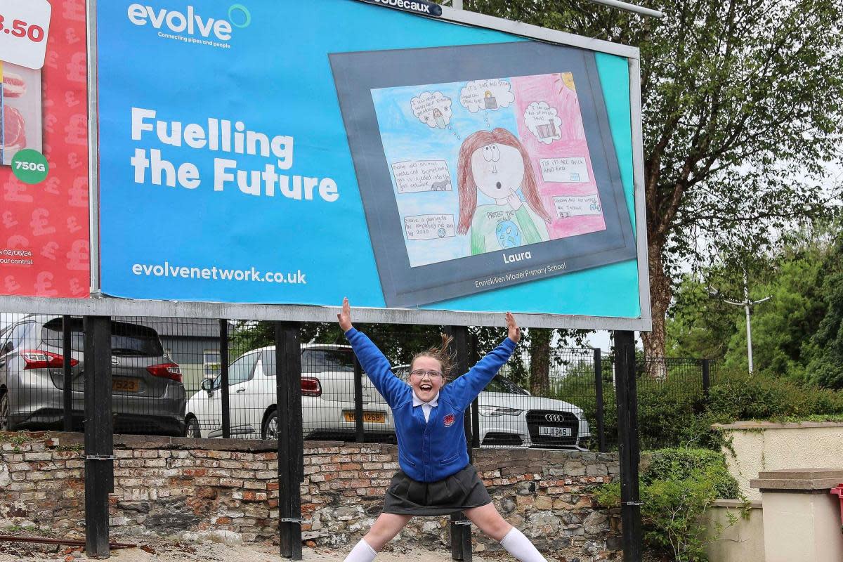 Local pupil Laura Hughes is jumping for joy after being named the Enniskillen winner of Evolve’s ‘Fuelling the Future’ art competition. <i>(Image: Evolve.)</i>