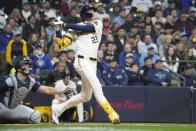 Milwaukee Brewers' Christian Yelich (22) hits a home run during the sixth inning of a baseball game against the Seattle Mariners, Friday, April 5, 2024, in Milwaukee. (AP Photo/Kayla Wolf)
