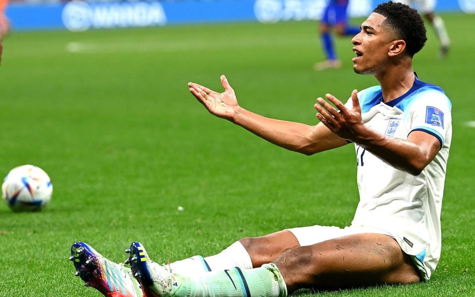 England gestures during the FIFA World Cup 2022 group B soccer match between England and the USA at Al Bayt Stadium in Al Khor - Shutterstock