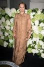 <p>Kate Moss looks wonderful in chic full length dresses like this gold, silk version. More, please! <i>[Photo: PA]</i></p>