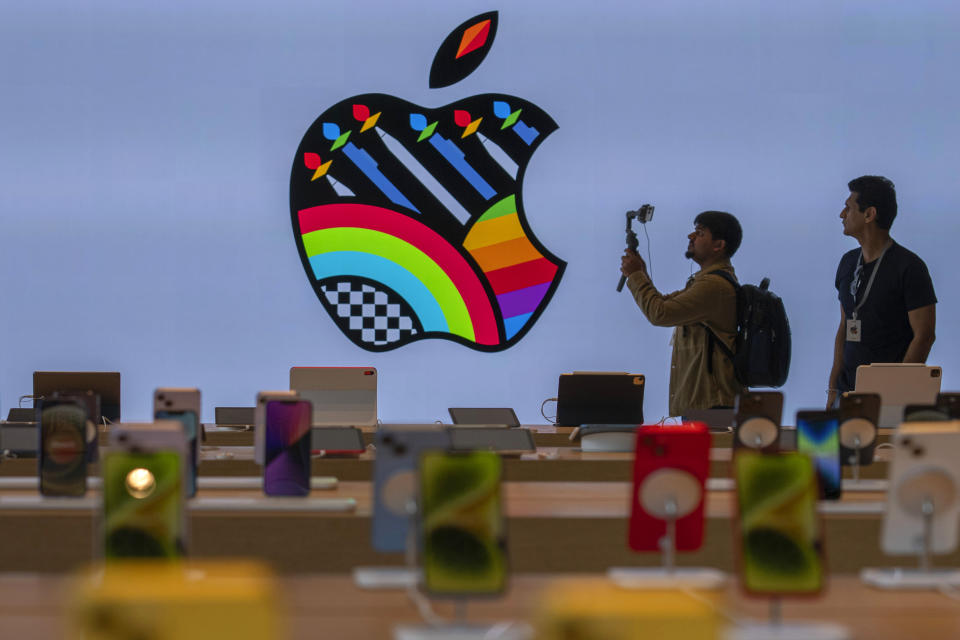 iPhones are on display during a press preview of India's first Apple Store in Mumbai, India, Monday, April 17, 2023. Apple will open its first retail store in India in Mumbai on Tuesday. (AP Photo/Rafiq Maqbool)