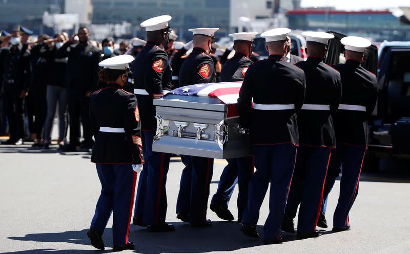 The remains of U.S. Marine Sgt. Johanny Rosario Pichardo arrive in Boston