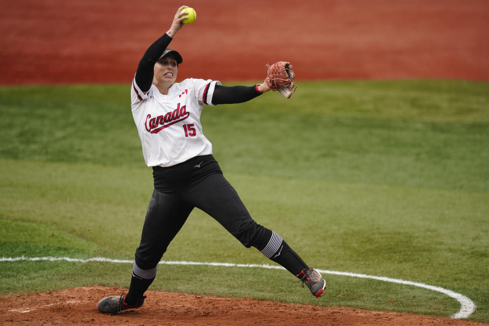 Canada's Danielle Lawrie pitches during a softball game against Italy at Yokohama Baseball Stadium during the 2020 Summer Olympics, Monday, July 26, 2021, in Yokohama, Japan. (AP Photo/Matt Slocum)