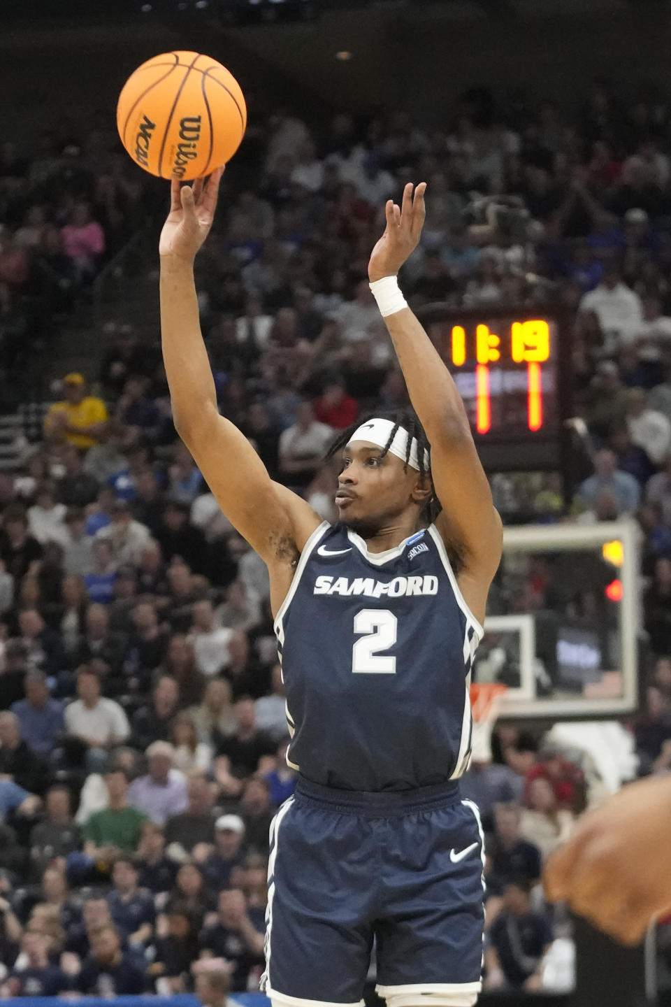 Samford guard Jaden Campbell (2) shoots a 3-pointer against Kansas during the first half of a first-round college basketball game in the NCAA Tournament in Salt Lake City, Thursday, March 21, 2024. (AP Photo/Rick Bowmer)