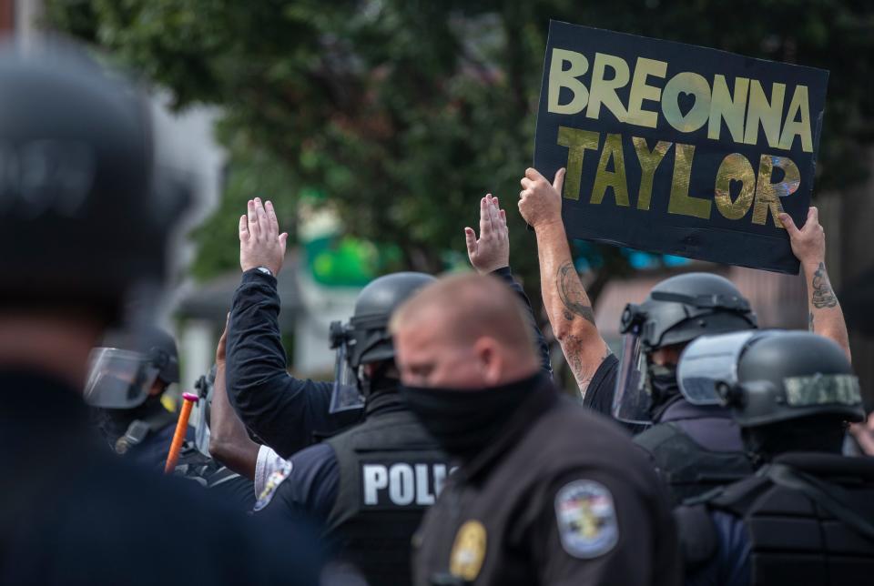 Protesters are stopped on Bardstown Road in Louisville, Kentucky, where several arrests are made. People took to the street to demonstrate the decision to charge only one Louisville Metro police officer from the night that Breonna Taylor was shot and killed. Sept. 23, 2020.