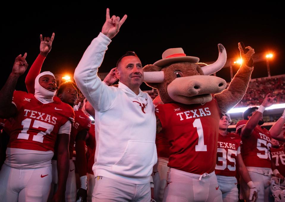 Texas Head Coach Steve Sarkisian sings "The Eyes of Texas" with the team after the Longhorns' game against the Texas Tech Red Raiders, Friday, Nov. 24, 2023 at Darrell K Royal-Texas Memorial Stadium in Austin.