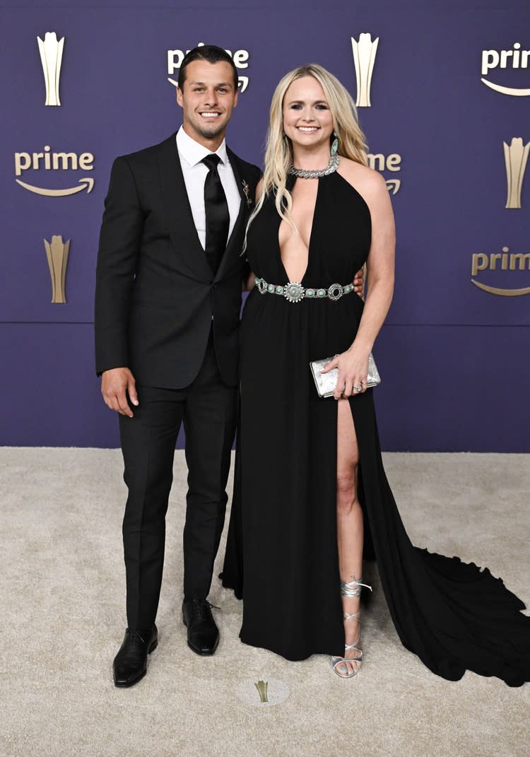 Miranda Lambert and Brendan McLaughlin wearing dress shoes at the 2024 ACM Awards