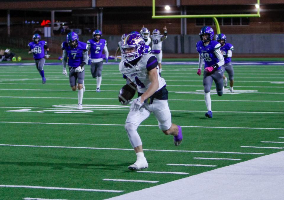 Early's Andrew Reedy (4) runs down the sideline after a catch in a matchup against Odessa Compass Academy at San Angelo Stadium on Nov. 10, 2023.