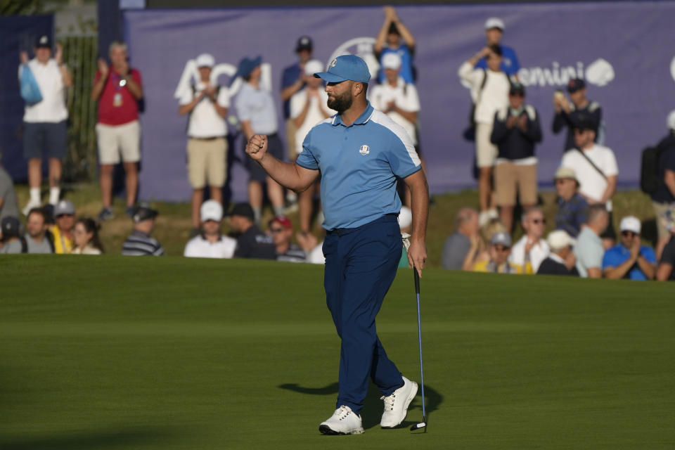 Europe's Jon Rahm celebrates on the 5th green during his morning Foursome match at the Ryder Cup golf tournament at the Marco Simone Golf Club in Guidonia Montecelio, Italy, Friday, Sept. 29, 2023. (AP Photo/Alessandra Tarantino)