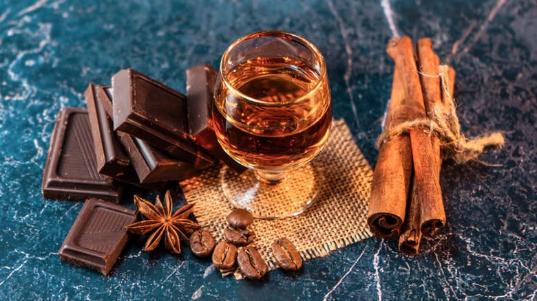 Whiskey, chocolate, and cinnamon sticks 