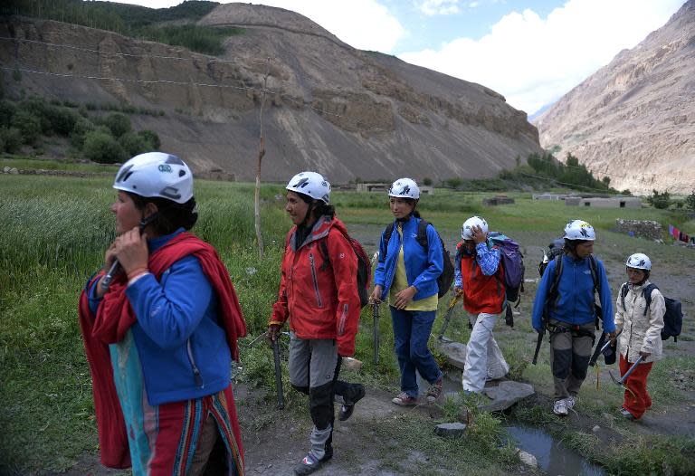 Students from the Shimshal Mountaineering School prepare to climb a mountain in Pakistan's northern Hunza valley, on August 4, 2014