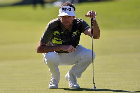 Feb 17, 2018; Pacific Palisades, CA, USA; Bubba Watson lines up a putt on the 11th green during the third round of the Genesis Open golf tournament at Riviera Country Club. Orlando Ramirez-USA TODAY Sports