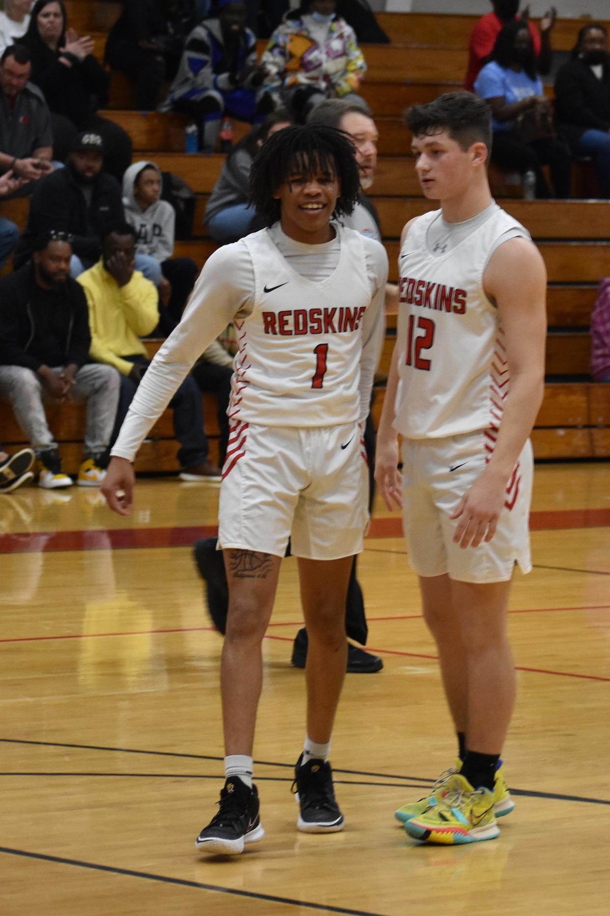 Bryan County High School junior point guard Jamal Campbell (1) with teammate Tanner Ennis (12), a sophomore.