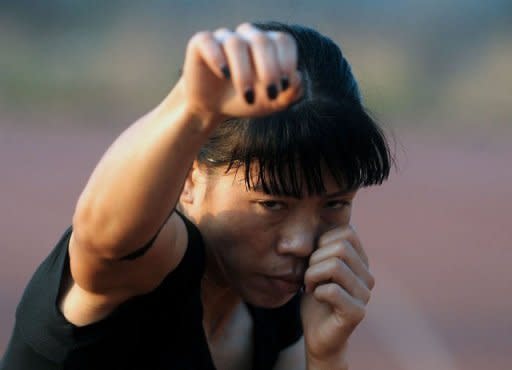 Indian boxer MC Mary Kom during a training session in Pune on April 20. From her beginnings as a poor farmers' daughter in a troubled corner of India, "Magnificent Mary" has fought her way up to become five-times world boxing champion
