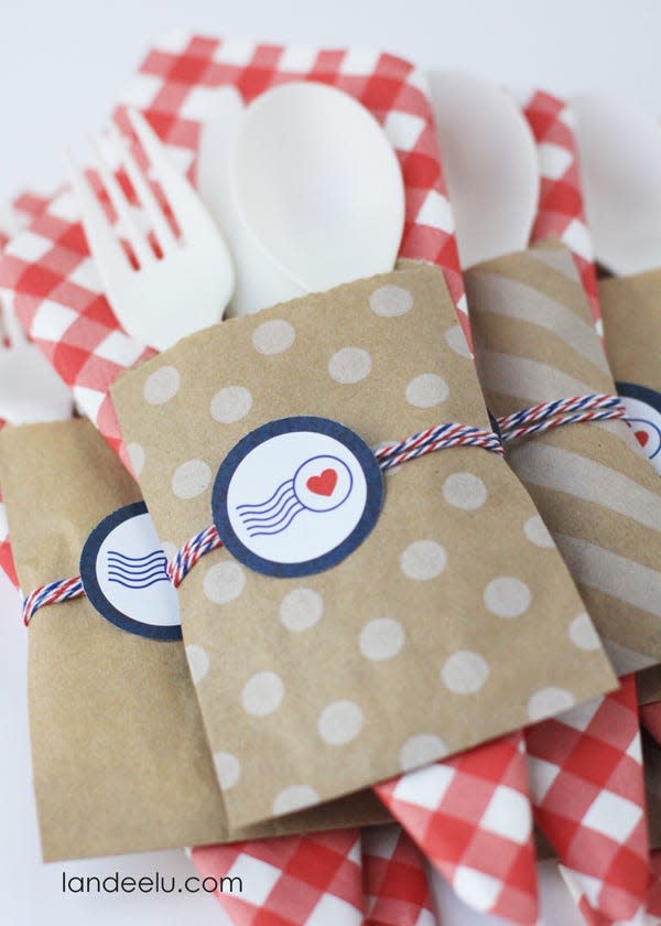 <p>Hand out plastic cutlery in style with the help of these festive utensil holders. </p><p>Get the<strong> <a href="https://www.landeeseelandeedo.com/4th-july-party-idea-patriotic-utensil-holders/" rel="nofollow noopener" target="_blank" data-ylk="slk:Patriotic Utensil Holders tutorial;elm:context_link;itc:0;sec:content-canvas" class="link ">Patriotic Utensil Holders tutorial</a> </strong>at Landeelu. </p>