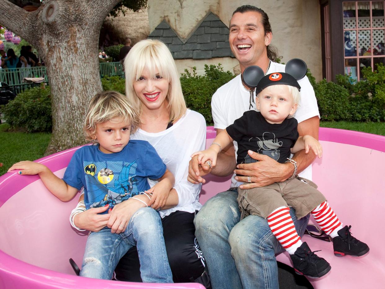 Gwen Stefani and Gavin Rossdale, with their children, Kingston, 4, and Zuma, 1, visit the Mad Tea Party attraction at Disneyland on July 7, 2010 in Anaheim, California