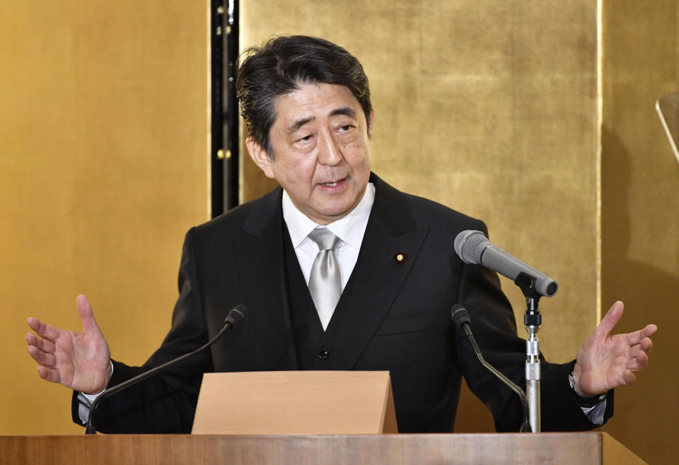 Japan's Prime Minister Shinzo Abe delivers his speech during New Year's press conference in Ise, central Japan, Friday, Jan. 4, 2019. Abe confirmed in his New Year’s news conference that the era name for the new emperor’s reign will be disclosed April 1, 2019. (Iori Sagisawa/Kyodo News via AP)