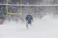 <p>A stadium worker clears the field during a timeout in the second quarter of the game between the Indianapolis Colts and the Buffalo Bills at New Era Field. Mandatory Credit: Rich Barnes-USA TODAY Sports </p>