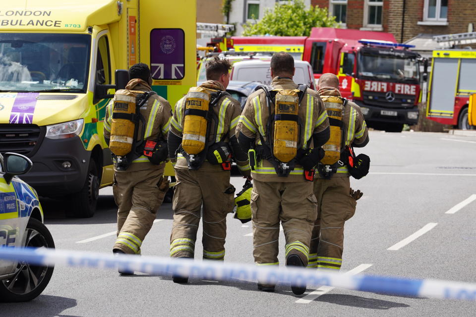 Firefighters tackling a blaze at a 17-storey block of flats in St Mark's Square in Bromley, south-east London. Picture date: Sunday July 3, 2022.