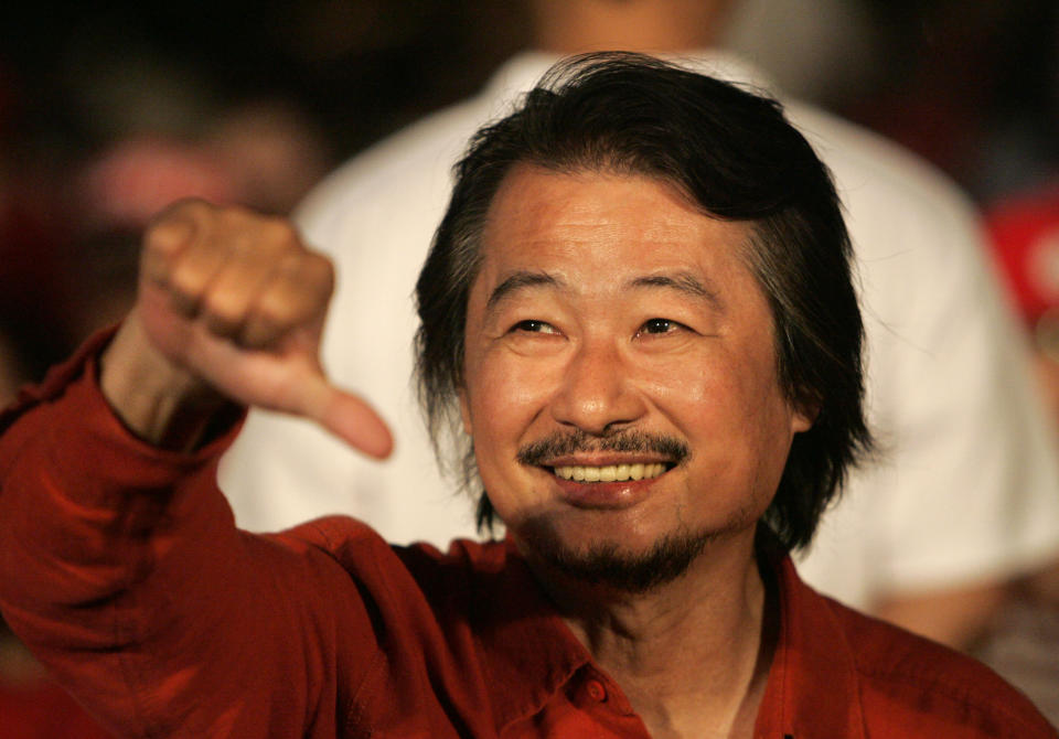 FILE - Taiwan human rights veteran Shih Ming-teh leads a march against Taiwan's President Chen Shui-bian during an open-ended protest as protesters move from the main train station back to the front of the Presidential Office in Taipei, Taiwan, on Sept. 21, 2006. Shih, a democracy activist who helped lead Taiwan from authoritarianism to democracy and a former chairman of the ruling Democratic Progressive Party, died Monday, Jan. 15, 2024, at the age of 83, his family said. (AP Photo/Wally Santana, File)