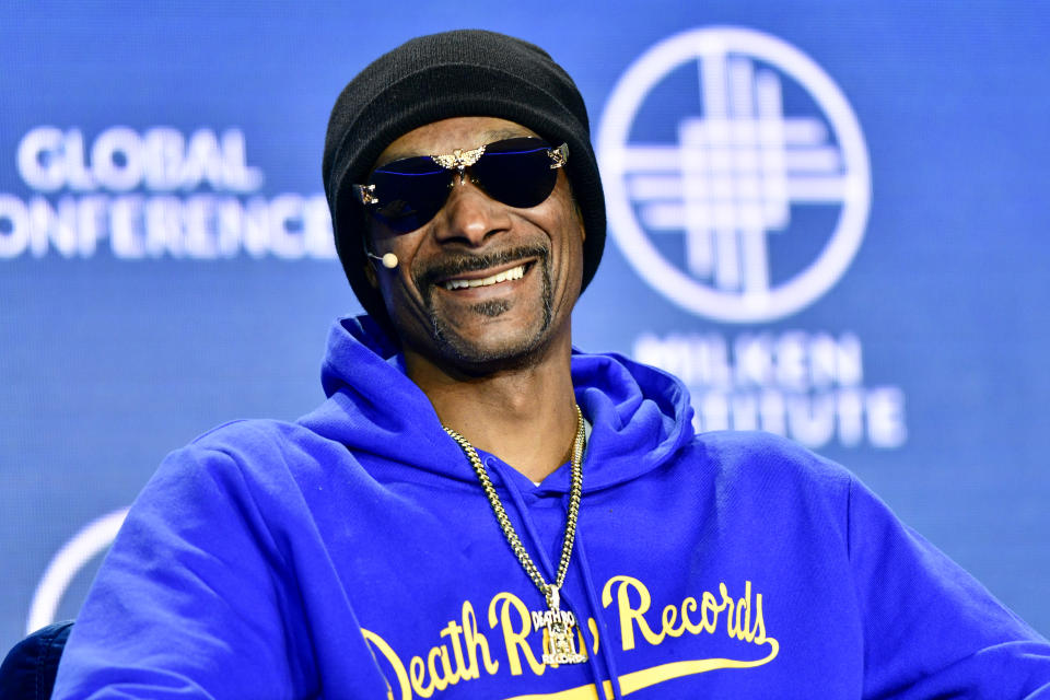 Snoop Dogg smiling.