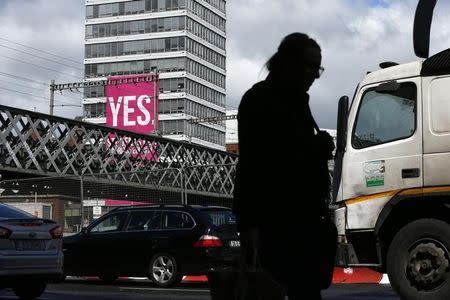 A large banner supporting a Yes vote hangs from a building in the Quays area of Dublin in Ireland May 19, 2015. REUTERS/Cathal McNaughton