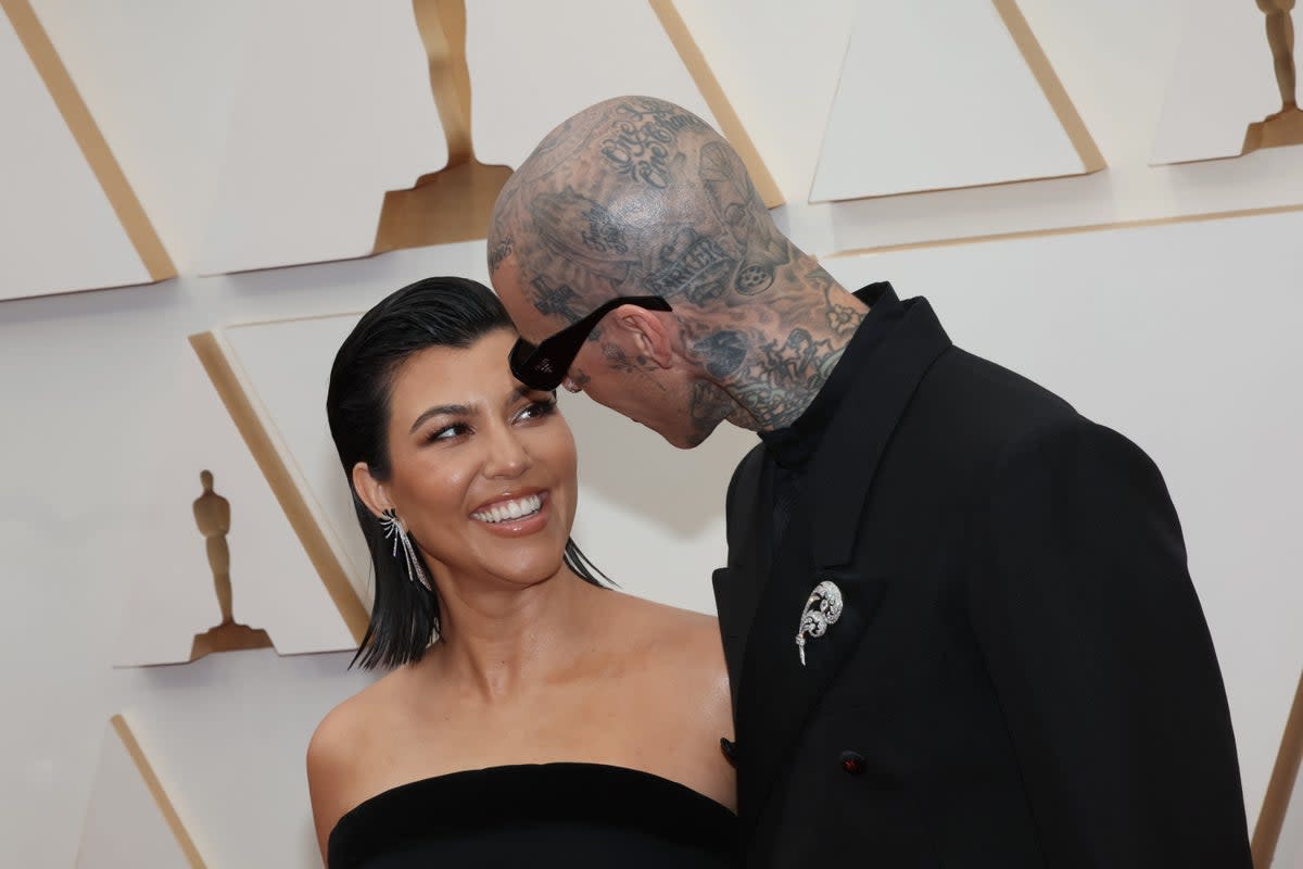 Kourtney Kardashian and Travis Barker in March 2022 (Getty Images)