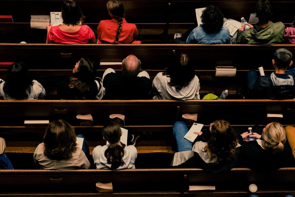 Prospective students and their families gather in Memorial Chapel, on the Wesleyan University campus in Middletown, Conn. on Nov. 11, 2022. Wesleyan and a growing number of colleges no longer require standardized tests for admission. (Bea Oyster/The New York Times)