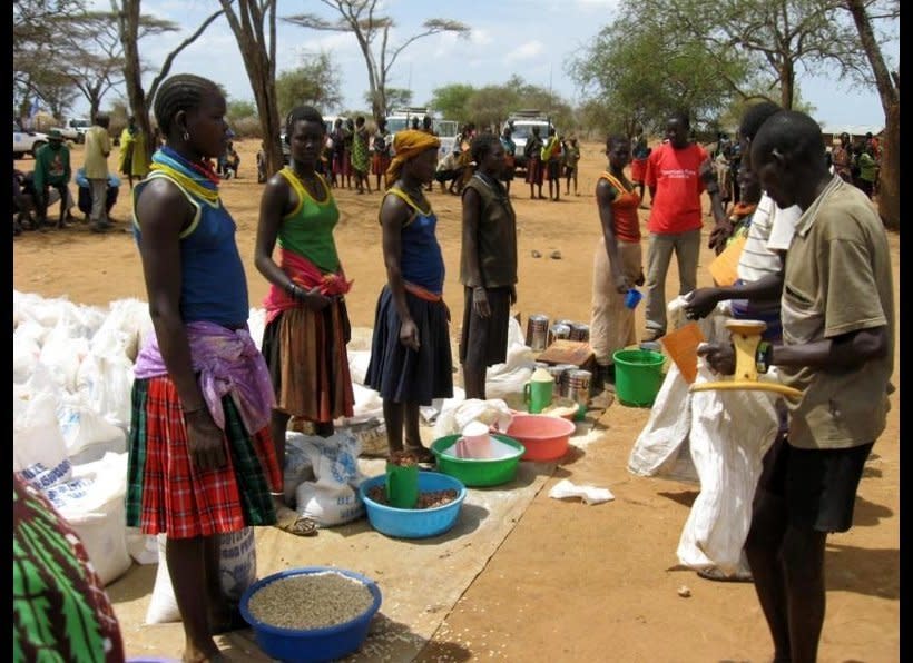 Women in Moroto town, in Karamoja region, line up for the United Nation food distribution. Karamoja is one of the most impoverished regions in Uganda with illiteracy rates up to 92 per cent.   Although is forbidden by law, some 90 per cent of girls in Karamoja have suffered genital cutting before the age of 15, a procedure that often takes place in bushes and caves.  The practice involves "cutting" a girl's vagina to create a seal that narrows the opening, just wide enough to allow the passing of urine and menstrual blood.   In Uganda, female genital mutilation is practiced in Sebei region-Eastern Uganda, and in the Karamoja region. 