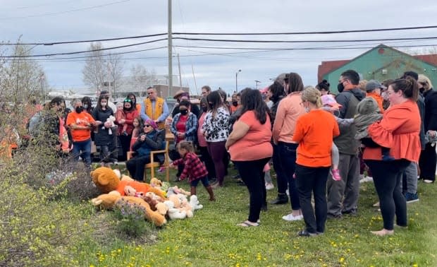 Dozens of people turned out, with only a few hours notice, in Happy Valley-Goose Bay on Monday to mourn after the remains of hundreds of children were found at the former Kamloops Indian Residential School. (Regan Burden/CBC - image credit)