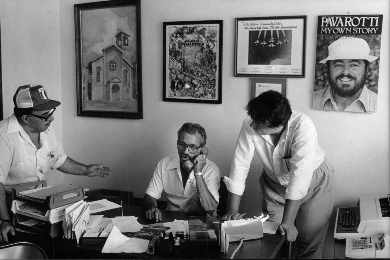 Louis Aveni (left), Paul Iannelli (center) and Wally Rosso busy with Festa Italiana preparations at the Italian Community Center.