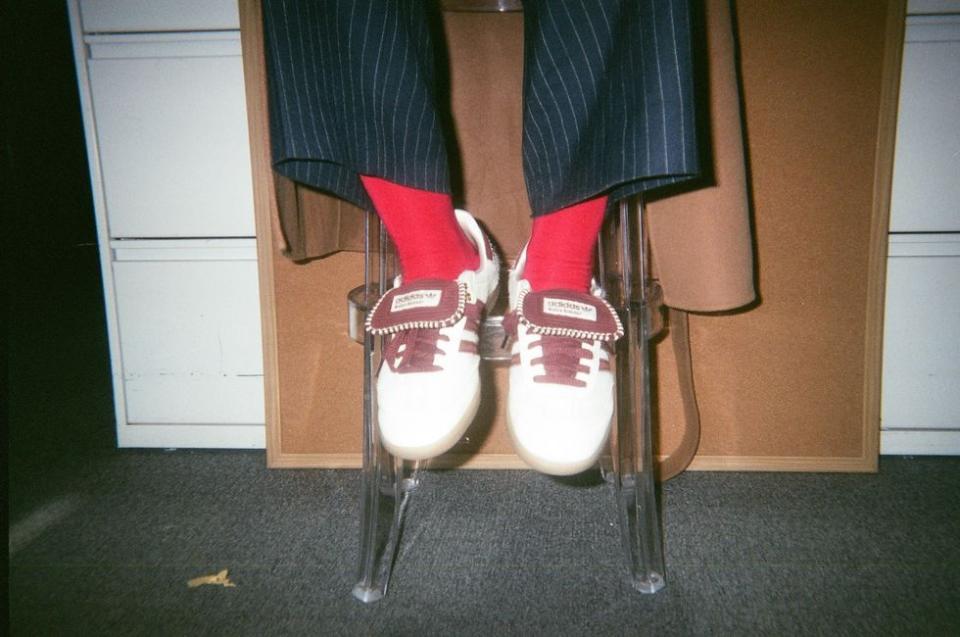 a person's feet on a stool