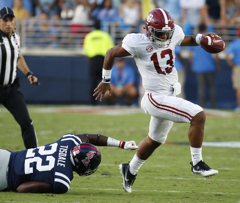 Tua Tagovailoa (13) and the Crimson Tide have been rolling early on this season. (AP)